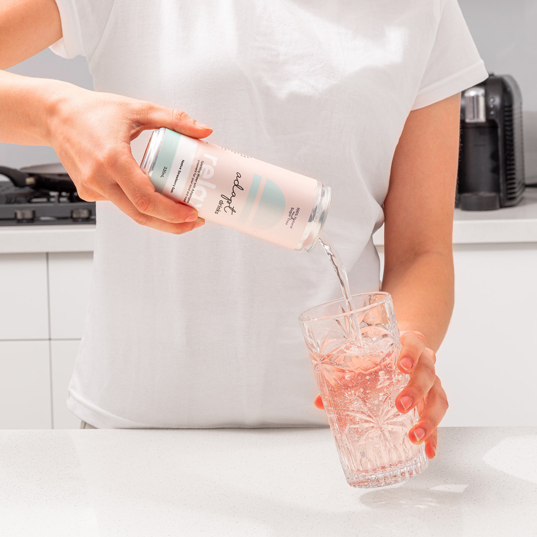 woman pouring adaptogenic drink to help with sleep